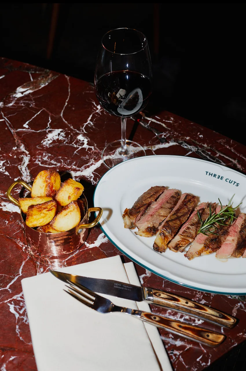 Modern steakhouse Dubai interior at Three Cuts Steakhouse Palm Jumeirah